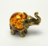 Фигурка из латуни с янтарем Слон с шаром арт. 1077